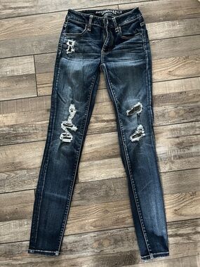 American Eagle Outfitters Dark Blue Distressed Skinny Jeans Size 0